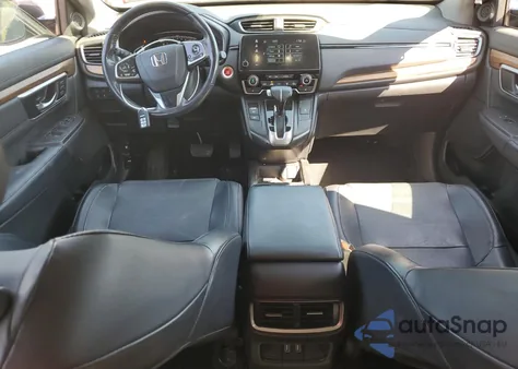 2019 Honda Cr-V Touring z USA, uszkodzony, nr VIN 2HKRW2H97KH140251